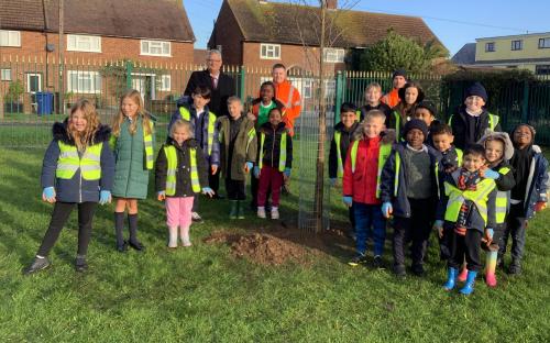 Cllr Mark Hooper, Cabinet Member for Health and Well-being, joined pupils from Stifford Clays Primary School to plant trees as part of National Tree