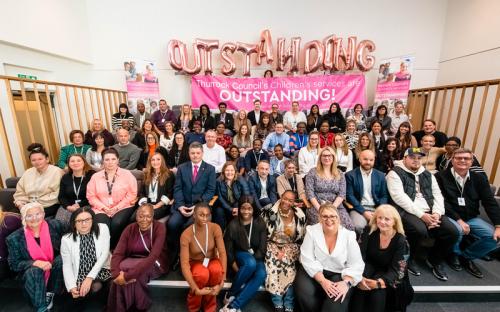 Cllr John Kent, Leader of Thurrock Council (second row from front, fifth from left) and Cllr Vikki Hartstean, Cabinet Member for Children’s Services (second row from front, fourth from right) celebrate with teams across Children’s Social Care & Early Help Services