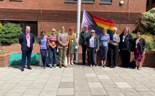 The progress flag raising outside the Civic Offices