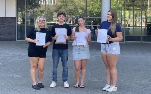 Students from South Essex College in Grays with their results