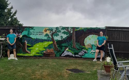 Artists with Broome Place mural