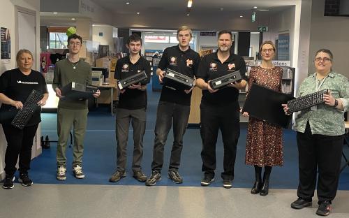 Cllr Hartstean (second from right) with staff from Every Child Online and Grays Library