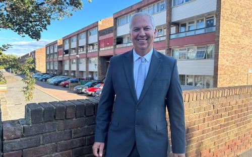 Cllr Hurrell, Cabinet Member for Social Housing outside Seabrooke Rise in Grays