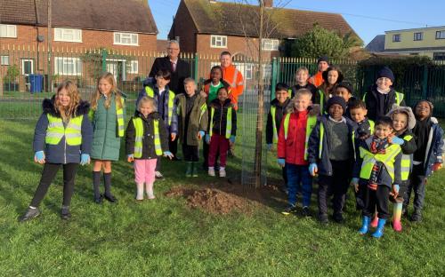 Cllr Mark Hooper, Cabinet Member for Health and Well-being, joined pupils from Stifford Clays Primary School to plant trees as part of National Tree