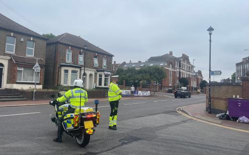 Police officers carrying out driving checks in Grays